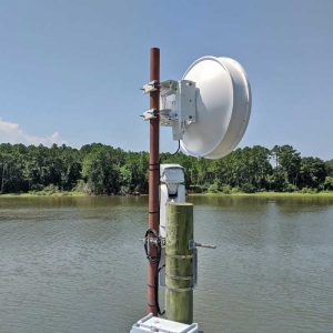 tower-overlooking-water-datatrust-tower-and-telecom